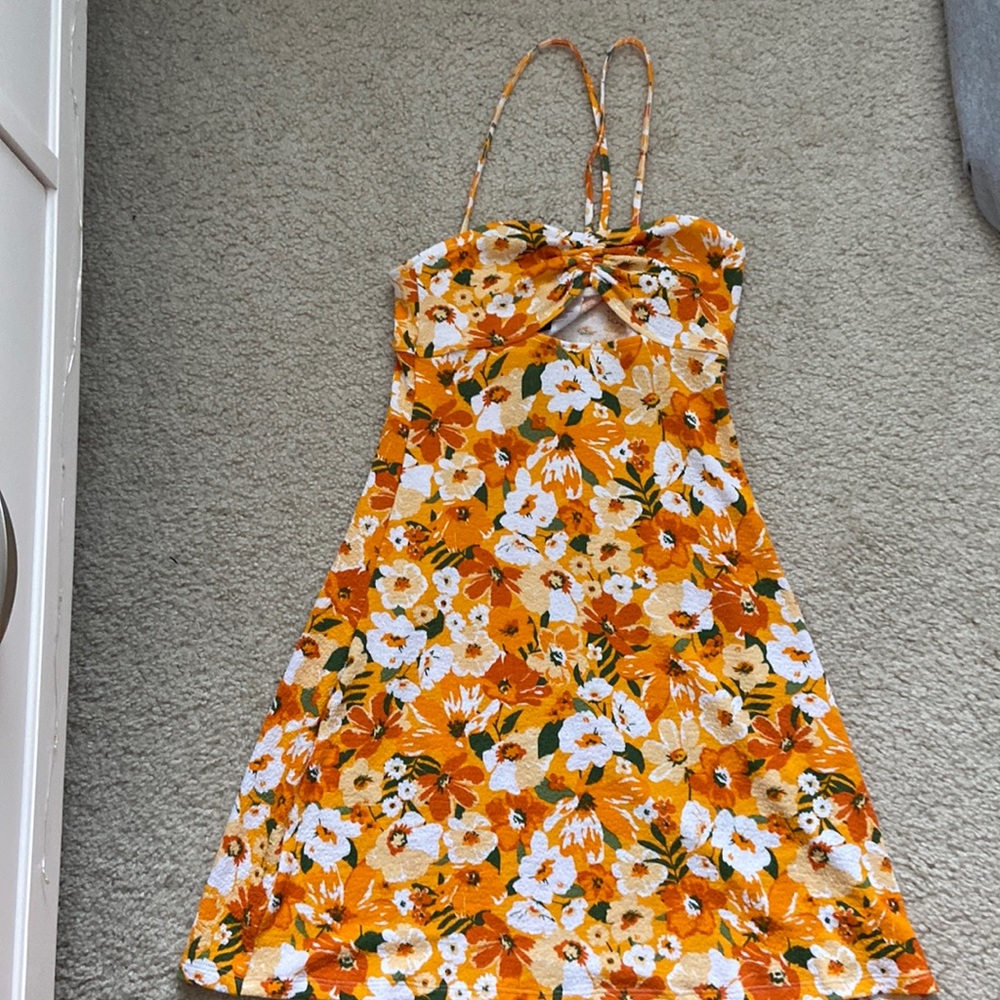 adorable floral summer dress with an opening in the chest